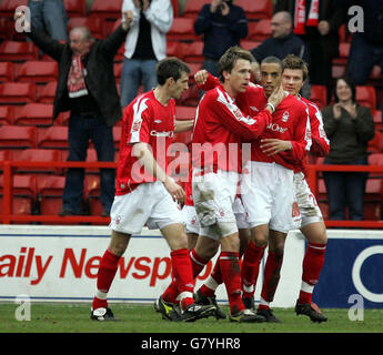 Soccer - Coca-Cola Football League Championship - Nottingham Forest v Wigan Athletic - City Ground. Nottingham Forest's Gareth Taylor (2nd from left) celebrates scoring against Wigan with team-mates Stock Photo