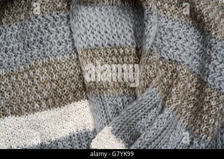 Close up of knitted gray beige shawl scarf Stock Photo