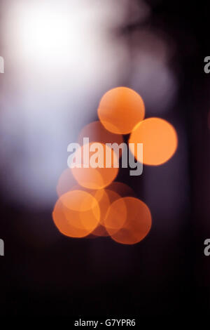 several orange bokeh with blurred circles Stock Photo