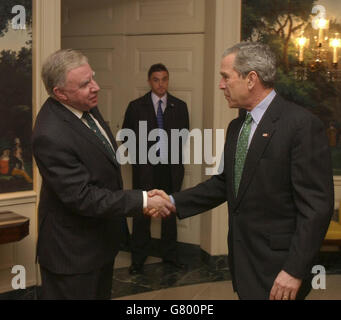 Paul Murphy, the Secretary of State for Northern Ireland meeting President George W Bush at the White House for the annual St Patrick's Day celebrations in Washington. Stock Photo