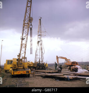 A drilling rig at work on what was intended to be an air shaft to the pit area in which the seven men were believed to be trapped. Stock Photo