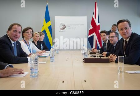 Prime Minister David Cameron (first right) holds a bilateral meeting with Swedish Prime minister Stefan Lofven (first left) during the Eastern Partnership Summit in Riga, Latvia today. Stock Photo