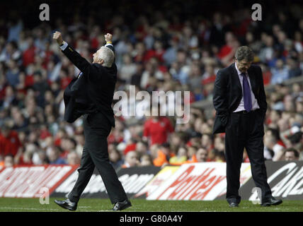 Soccer - FIFA World Cup 2006 Qualifier - Group Six - Wales v Austria - Millennium Stadium. Austria Manager Hans Kranki (left) celebrates the 2nd goal as Wales Manager John Toshack (right) shows his dejection. Stock Photo