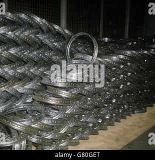 Thousands of wheel rims for the 750cc Bonneville model stacked at the Norton Villiers Triumph Motorcycle factory in Meridan, West Midlands. They are obtained from an outside supplier. Stock Photo