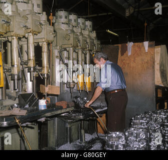 Noel Reid drilling cylinder heads at Norton Villiers Triumph Motorcycle factory in Meriden, West Midlands. Stock Photo