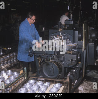 Phil Walker working on the intermediate gear whole in the crankcase at Norton Villiers Triumph Motorcycle factory in Meridan, West Midlands. Stock Photo