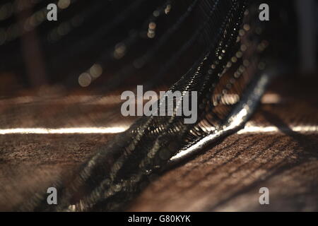 Tennis - 2015 French Open - Day Twelve - Roland Garros. A general view of a net on day twelve of the French Open at Roland Garros on June 4, 2015 in Paris, France