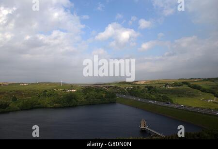 Views of Scammonden Reservoir which supplies Huddersfield from its location west of the M62 motorway in West Yorkshire. Yorkshire Water launches its annual Water Conservation campaign which coincides this with World Environment Day. Stock Photo