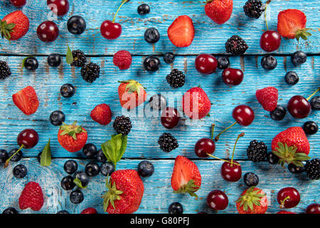Close-up of fresh berry fruit placed on old wooden planks Stock Photo