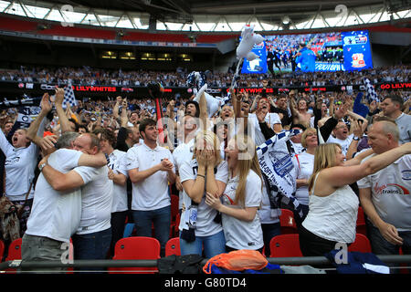 Preston North End supporters celebrate in the stands at Wembley Stock Photo