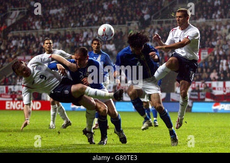 Soccer - FIFA World Cup 2006 Qualifier - Group Six - England v Azerbaijan - St James' Park. England's Wayne Rooney goes gets in a header on goal only for the effort to go over against Azerbaijan Stock Photo