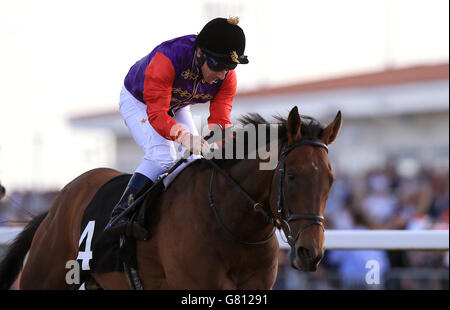 Horse Racing - Chelmsford City Racecourse. Pick Your Choice ridden by Seb Sanders wins The toteplacepot Maiden Stakes at Chelmsford City Racecourse, Essex. Stock Photo