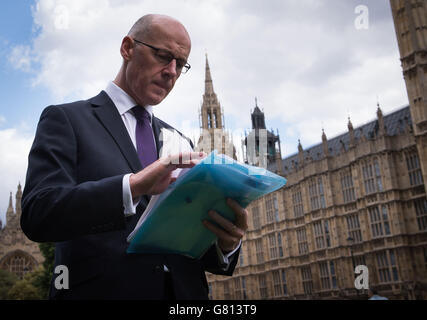 Scotland's Deputy First Minister John Swinney takes part in media interviews in Westminster, London, before meeting with Chancellor George Osborne where he will put forward the Scottish government's alternative plan to austerity. Stock Photo