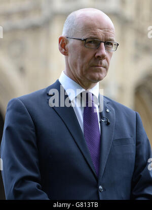Scotland's Deputy First Minister John Swinney takes part in media interviews in Westminster, London, before meeting with Chancellor George Osborne where he will put forward the Scottish government's alternative plan to austerity. Stock Photo