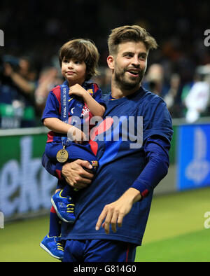 Soccer - UEFA Champions League - Final - Juventus v Barcelona - Olympiastadion. Barcelona's Gerard Pique and his son celebrate Stock Photo