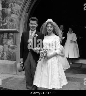 Richard Baker, BBC TV announcer, and his bride - formerly Margaret Martin - leave their wedding at St Mary The Boltons church in Kensington, London. Stock Photo