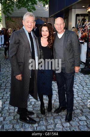 (Left - right) Sir Ian McKellen, Sunny Ozell and Patrick Stewart attending the UK premiere of Mr Holmes at the Odeon Kensington, London. Stock Photo