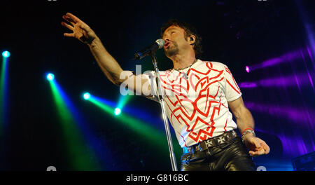 New frontman Paul Rodgers of Queen performs live on stage to kick of their European tour. It is the first time the band has toured since 1986. Stock Photo