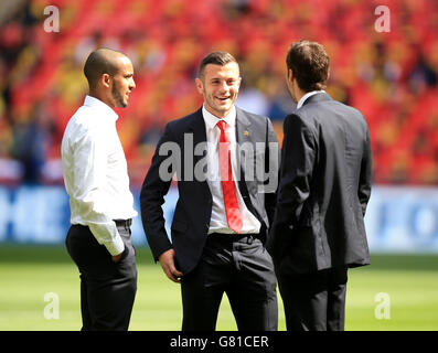 Arsenal's Jack Wilshere (centre), Theo Walcott (left) and Mathieu Flamini (right) on the pitch before kick-off Stock Photo