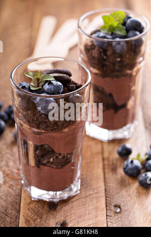 Chocolate pudding parfait with cookie crumbs Stock Photo