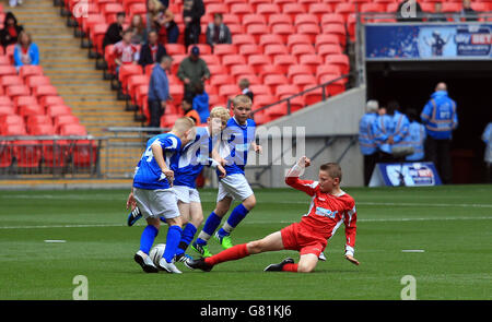 A general view of the action between The Oaks Primary school and South Failsworth Primary school during the Kinder+Sport Football League Kids Cup Final Stock Photo