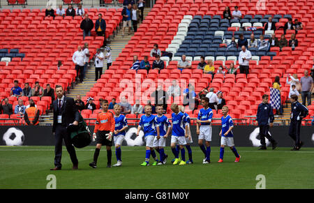 Oldham Athletic represented by South Failsworth Primary school walk out for the Kinder+Sport Football League Kids Cup Final Stock Photo