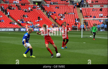 A general view of the action between The Oaks Primary school and South Failsworth Primary school during the Kinder+Sport Football League Kids Cup Final Stock Photo