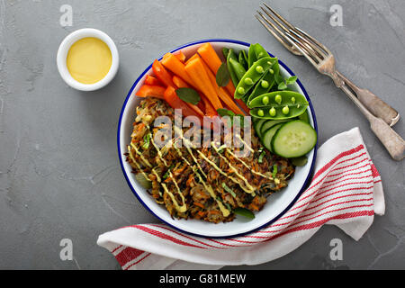 Potato carrot and spinach fritters Stock Photo