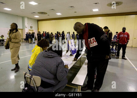 Voters line up to vote in US general election at a voting site in Harlem, New York, United States, 4 November 2008. Stock Photo