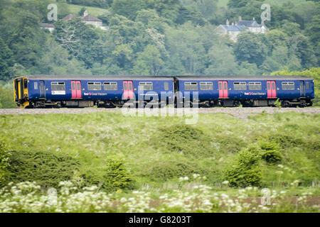 Railway stock. A First Great Western train passes through countryside on the London to Bristol line. Stock Photo