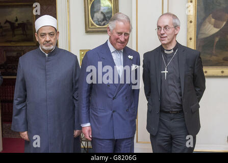 The Prince of Wales receives the Grand Imam of Al-Azhar, Professor Dr. Mohamed Ahmed el-Tayeb (left) and the Archbishop of Canterbury the Most Reverend Justin Welby (right) at Clarence House in London. Stock Photo