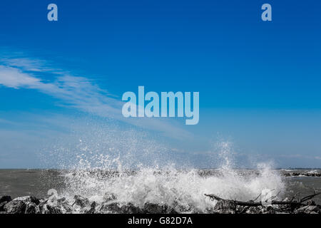 Crashing Wave on the rocks in Italy Stock Photo