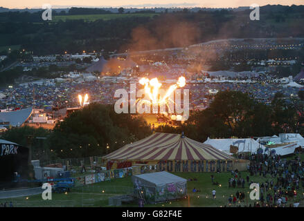 Glastonbury Festival 2015 - Preparations. Flames shooting out of a giant spider at Arcadia, during the Glastonbury Festival at Worthy Farm in Somerset. Stock Photo