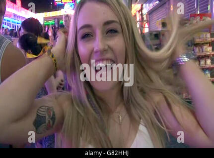 Screen grab taken from PA Video of Hannah MacDonald, 19, from Perth, Scotland, on the Punta Ballena strip in Magaluf, Spain, as the town saw tough new rules cracking down on drunkenness come into force at midnight - but the resort still witnessed the debauched scenes that have made it infamous. Stock Photo