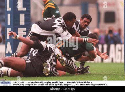 14-OCT-95 .... Australia v Fiji, Rugby World Cup .... Australia's Brad Fittler is eventually stopped just under the posts by 4 Fiji players Stock Photo