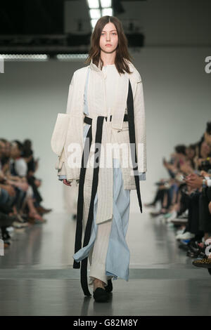 A model on the catwalk at the Craig Green show during the British Fashion Council's London Collections: Men at Victoria House in London. Stock Photo