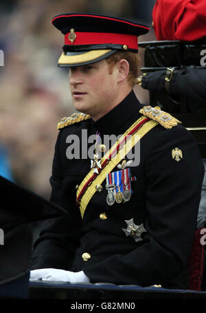 Prince Harry leaves Buckingham Palace in a horse drawn carriage to attend Trooping the Colour at Horse Guards Parade, London. Stock Photo