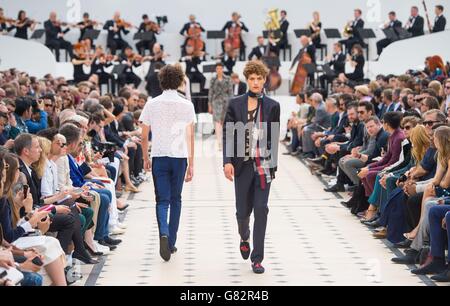 Models on the catwalk during the Burberry Prorsum catwalk show at Kensington Gardens, London, part of the British Fashion Council's London Collections: Men 2015.
