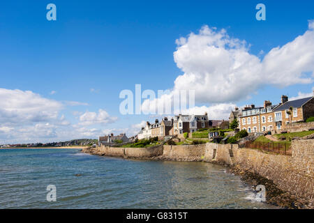 Seafront buildings above seawall at high tide in village on Firth of Forth coast. Elie and Earlsferry, East Neuk of Fife, Fife, Scotland, UK, Britain Stock Photo