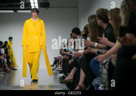 A model on the catwalk at the Craig Green show during the British Fashion Council's London Collections: Men at Victoria House in London. Stock Photo