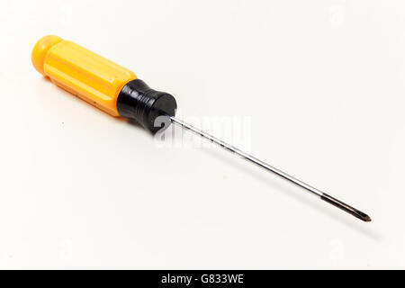 Small screwdriver on white background. Isolated On White, Objects with Clipping Paths Stock Photo