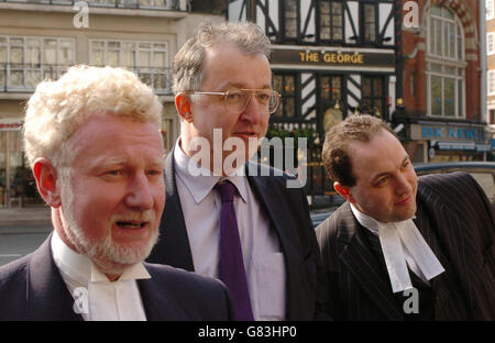 Deputy Leader of Birmingham City Council John Hemming (centre) arrives at the Royal Courts of Justice, with Jerry Hayes on the left a former tory MP for Harlow who is also a barrister. Stock Photo