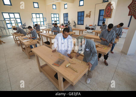 Students practice in woodworking class at the Institute of Traditional Arts in Fez, Morocco. Stock Photo