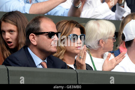 Mirka Federer watches husband Roger on day One of the Wimbledon Championships at the All England Lawn Tennis and Croquet Club, Wimbledon. Stock Photo