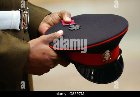Iraq war hero Private Johnson Beharry with his Victoria Cross and ...