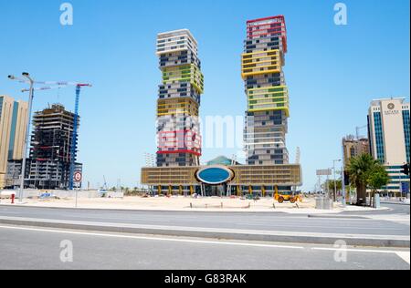 Rapidly developing new city of Lusail, Qatar. The colourful Twin Towers high rise aka “Building Blocks” in the Marina District Stock Photo