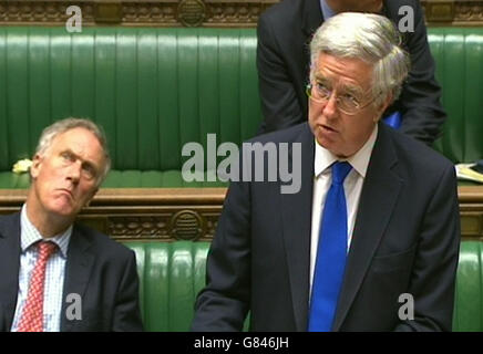 Defence Secretary Michael Fallon speaks in the House of Commons, London, where he is expected to tell MPs that Britain must reconsider the question of whether military air strikes against the Islamic State terror group should be extended into Syria. Stock Photo