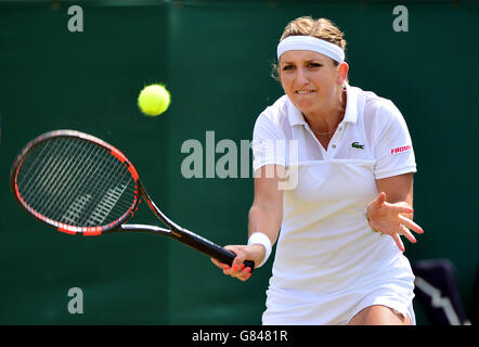 Timea Bacsinszky in action against Sabine Lisicki during day Six of the Wimbledon Championships at the All England Lawn Tennis and Croquet Club, Wimbledon. Stock Photo