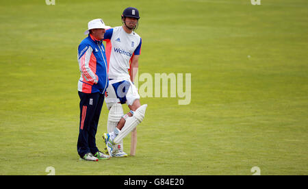 England head coach Trevor Bayliss with Alastair Cook during the nets session ahead of the First Investec Ashes Test at the SWALEC Stadium, Cardiff. Stock Photo