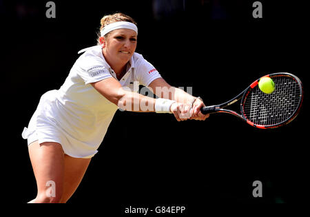 Timea Bacsinszky in action against Gabine Muguruza during day Eight of the Wimbledon Championships at the All England Lawn Tennis and Croquet Club, Wimbledon. Stock Photo
